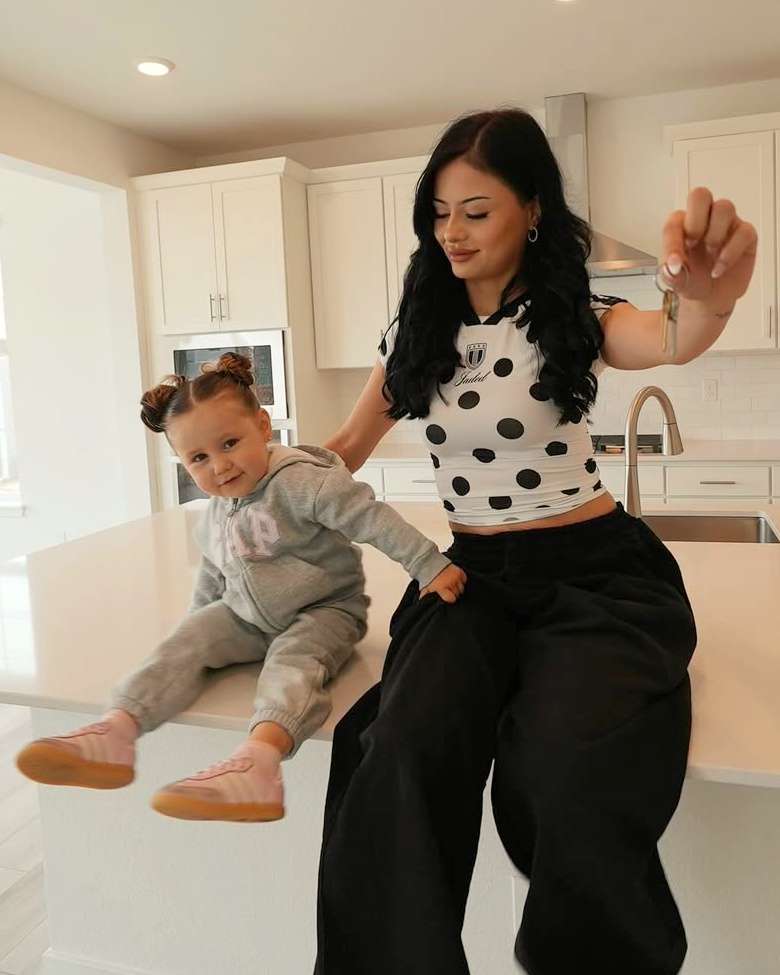 Wendy Ortiz plays with her daughter
